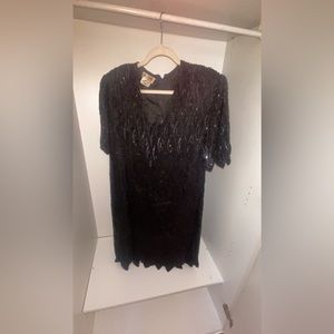 Black knee length sparkly dress